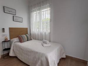 Postel nebo postele na pokoji v ubytování VMC Rooms