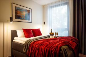 Postel nebo postele na pokoji v ubytování Hessnery Hotel