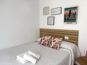 Postel nebo postele na pokoji v ubytování VMC Rooms