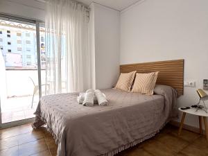Postel nebo postele na pokoji v ubytování VMC Rooms