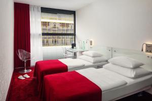 Posteľ alebo postele v izbe v ubytovaní Metropol Design Hotel Old Town