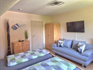 Ein Bett oder Betten in einem Zimmer der Unterkunft Ferienhaus Seefried