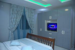 Postel nebo postele na pokoji v ubytování Kingston Luxury Apartments
