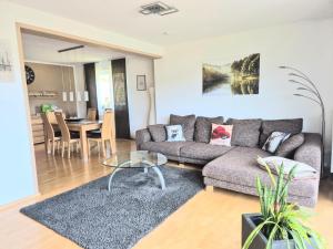 Ein Sitzbereich in der Unterkunft Ferienhaus Seefried