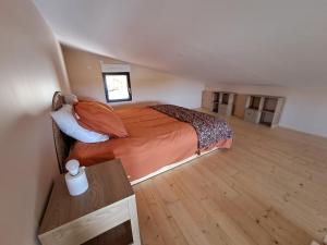 Ένα ή περισσότερα κρεβάτια σε δωμάτιο στο Logement à la campagne à 20min de l'océan
