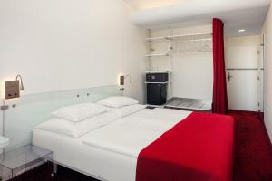Posteľ alebo postele v izbe v ubytovaní Metropol Design Hotel Old Town