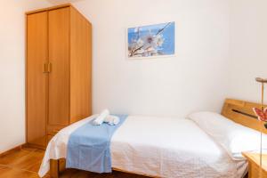Posteľ alebo postele v izbe v ubytovaní Apartamento Can Jaume