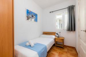 Posteľ alebo postele v izbe v ubytovaní Apartamento Can Jaume
