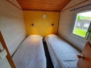Posteľ alebo postele v izbe v ubytovaní Résidence Les Chalets de Millau