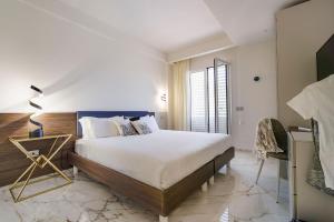 Postel nebo postele na pokoji v ubytování Villa Fico D'india + 32 fotografií