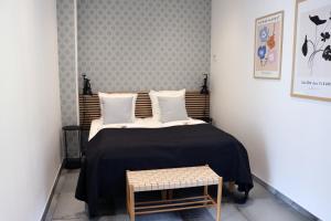 Postel nebo postele na pokoji v ubytování Hotel Petite B&B
