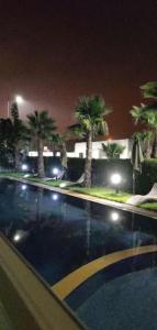 Kolam renang di atau dekat dengan Appartement de luxe à Heaven Beach Sidi Rahal