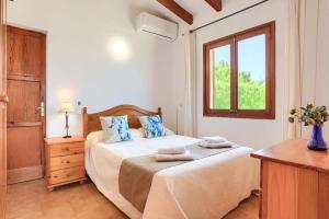 Posteľ alebo postele v izbe v ubytovaní Villa Can Pinto by Villa Plus