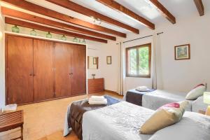 Posteľ alebo postele v izbe v ubytovaní Villa Can Pinto by Villa Plus + 37 fotografií