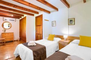 Posteľ alebo postele v izbe v ubytovaní Villa Can Pinto by Villa Plus