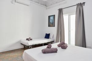 Postel nebo postele na pokoji v ubytování Key Barcelona HOUSING (Carrer Girona)