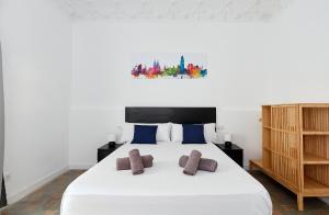 Postel nebo postele na pokoji v ubytování Key Barcelona HOUSING (Carrer Girona)