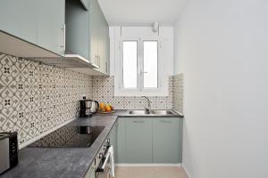 Kuchyň nebo kuchyňský kout v ubytování Key Barcelona HOUSING (Carrer Girona)