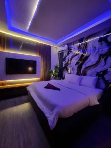 Letto o letti in una camera di REOApartment