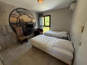 Postel nebo postele na pokoji v ubytování GuestHouse Le Patio34
