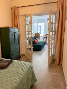 Postel nebo postele na pokoji v ubytování Le Cocon Chic Choc et Cosy