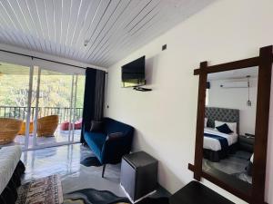 TV a/nebo společenská místnost v ubytování River Splendour Home Stay