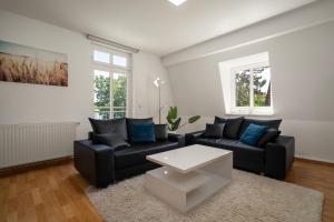 Posezení v ubytování Ferienwohnung Strandglück am Malchower See mit Garten