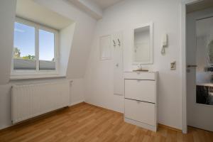 Fotografie z fotogalerie ubytování Ferienwohnung Strandglück am Malchower See mit Garten v destinaci Malchow