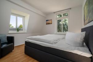 Posezení v ubytování Ferienwohnung Strandglück am Malchower See mit Garten