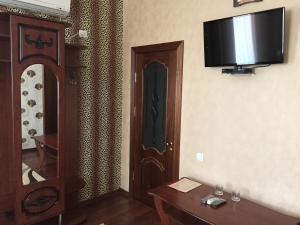 TV a/nebo společenská místnost v ubytování Hotel Oktan