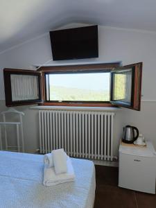 Postel nebo postele na pokoji v ubytování Casa Cicone