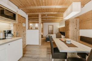 Kuchyň nebo kuchyňský kout v ubytování Garni Hotel Mezdi