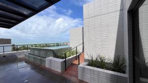 a view of the ocean from a building at Apartment in Praia de Formosa in Cabedelo