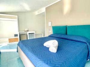 Postel nebo postele na pokoji v ubytování Hotel da Alfredo