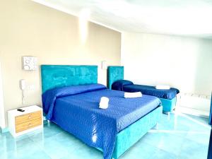 Postel nebo postele na pokoji v ubytování Hotel da Alfredo