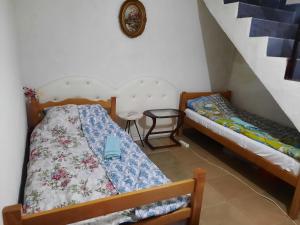 Postel nebo postele na pokoji v ubytování Bus Station Hostel
