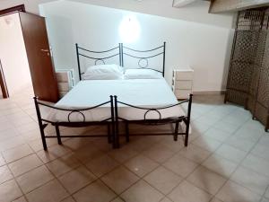 Postel nebo postele na pokoji v ubytování Villa Palumberi con Vasca Idromassaggio