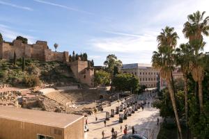 a view of the ruins of the ancient city at Teatro Romano 4 & 5 in Málaga