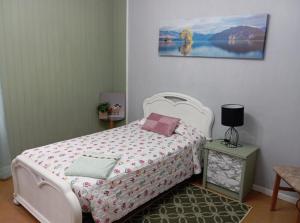 Postel nebo postele na pokoji v ubytování Casa Ana en Astillero