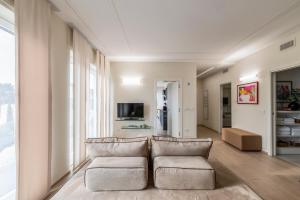 TV/trung tâm giải trí tại Vanity Tail Luxury Apartments