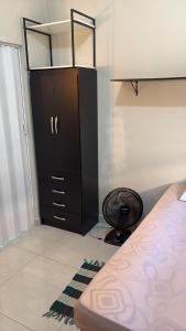 En eller flere senge i et værelse på 103 Flats Magguine - Interlagos