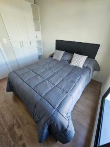 Postel nebo postele na pokoji v ubytování Modern and Functional Apartment