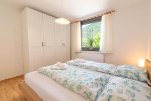Postel nebo postele na pokoji v ubytování Kranjska gora balcony apartment