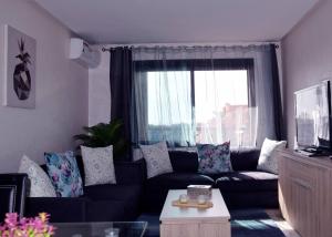 Χώρος καθιστικού στο Central Marrakech Stay Bright & Airy with Scenic Gueliz location