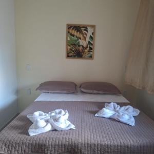 Postel nebo postele na pokoji v ubytování Pousada Casa Apoena