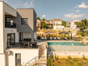 The swimming pool at or close to Seaview Villa A`More with heated pool