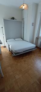 Ένα ή περισσότερα κρεβάτια σε δωμάτιο στο Appartamento Volta