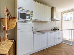 Kuchyň nebo kuchyňský kout v ubytování Studio Haas