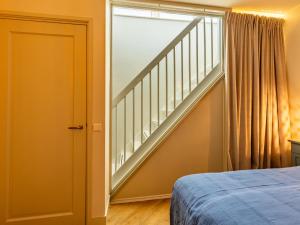 Postel nebo postele na pokoji v ubytování Studio Haas