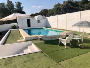 The swimming pool at or close to Casa La Soleá Cerro Muriano